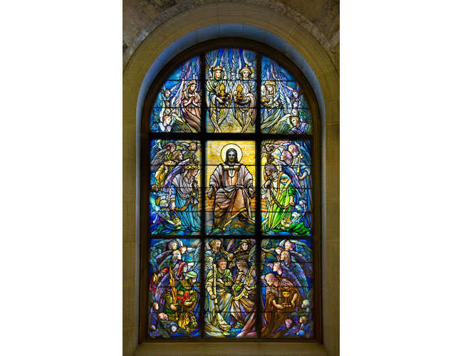 The Christ in Majesty window made by Tiffany Studios for Harbeck mausoleum, ca. 1917 is a highlight of the exhibition. Photograph by Gavin Ashworth. Courtesy The Woodlawn Cemetery. Harbeck Mausoleum Window