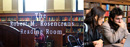 Students in the reference room of Butler Library.